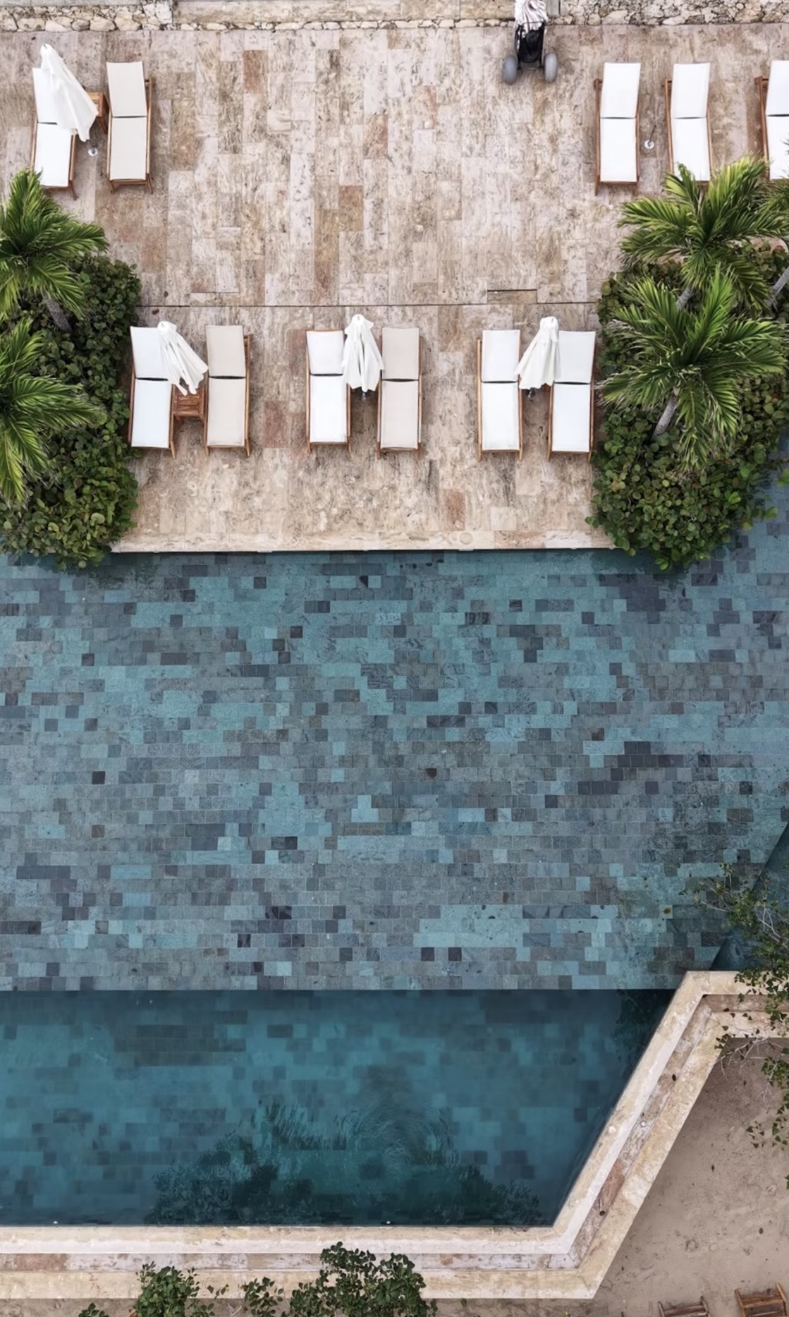 Aerial detail of loungers beside the pool