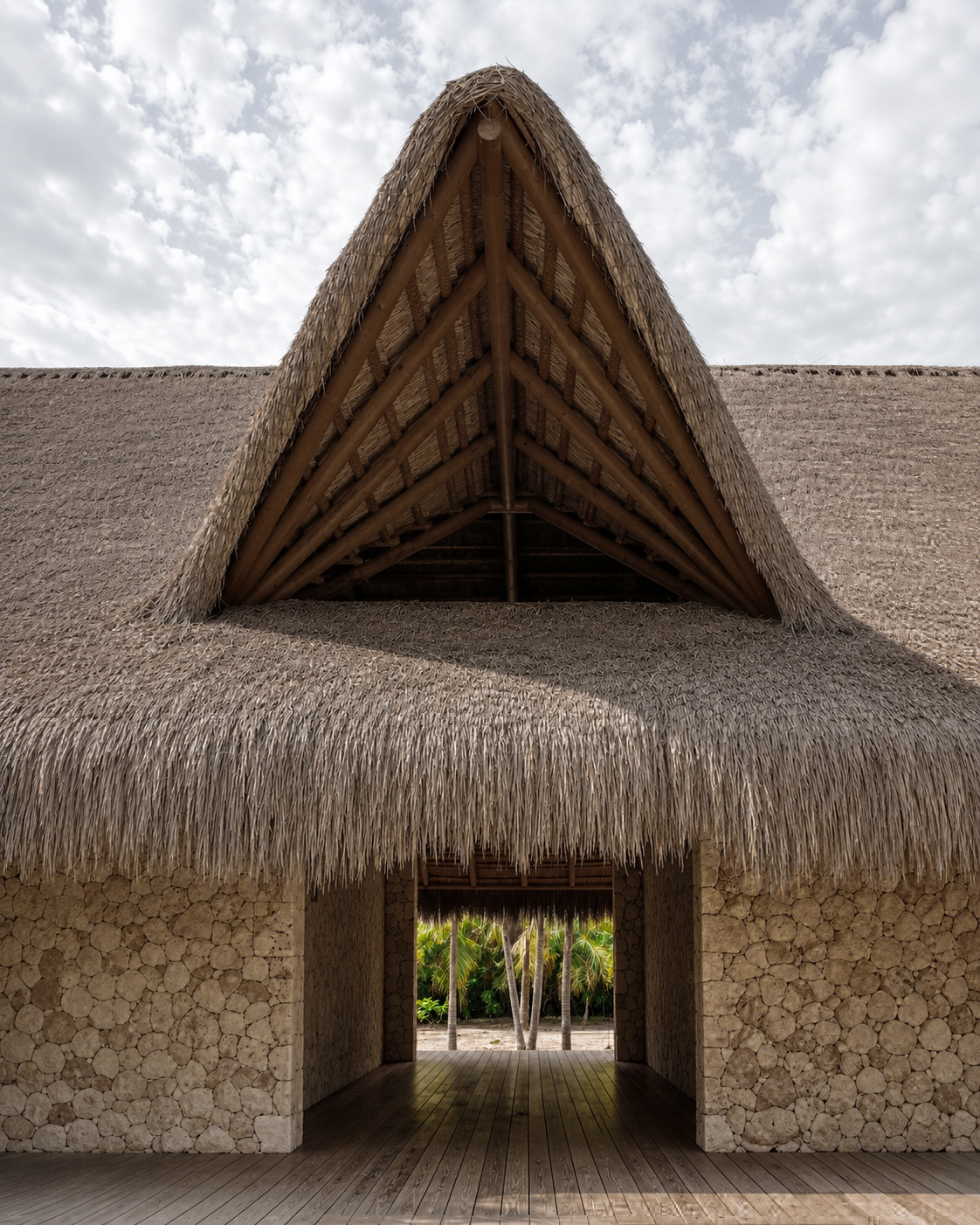 Sculptural thatched entrance architecture